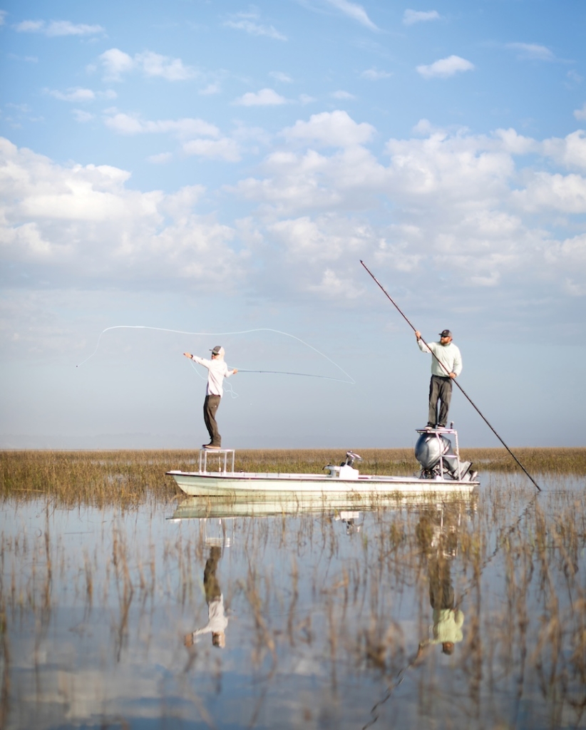 Captain Reid Williams sight fishing for redfish during high tide at Sea Island.