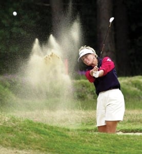 Dottie Pepper plays out of a bunker on the 14th hole at the Women's Weetabix British Open.