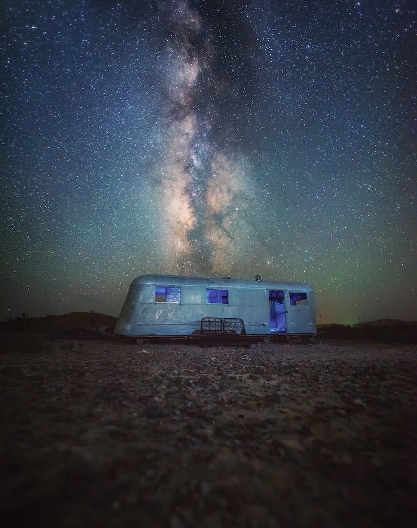 A trailer beneath the Texas night sky.